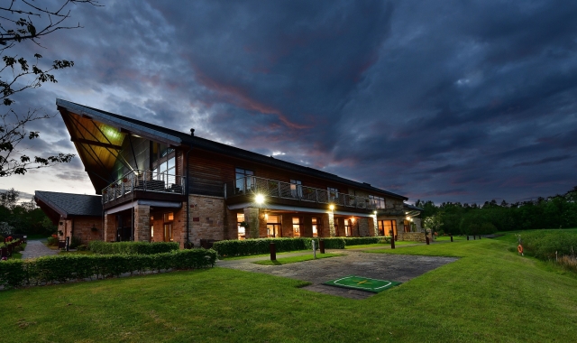 Exterior of the Cameron House Clubhouse at night time