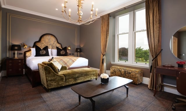 A spacious one bedroom suite at Cameron House with large windows