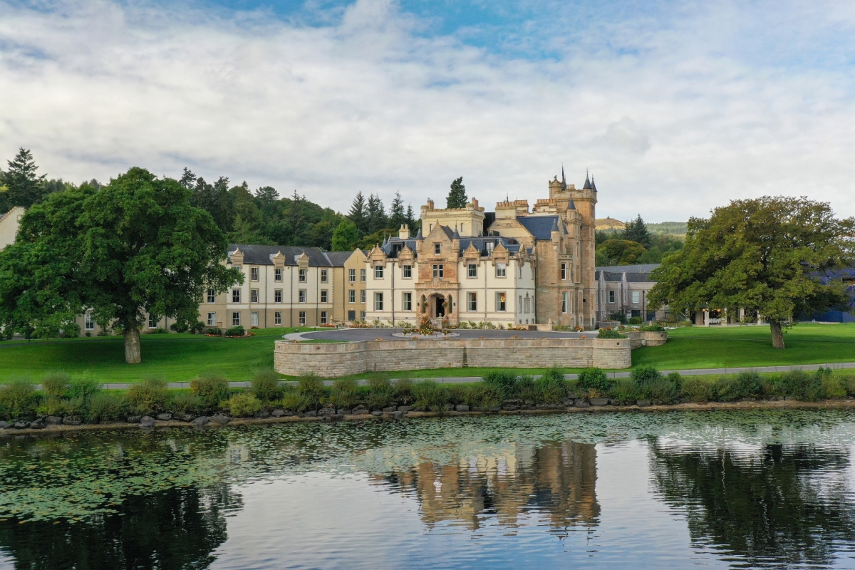 Exterior of the beautiful Camron House with a pond in the foreground