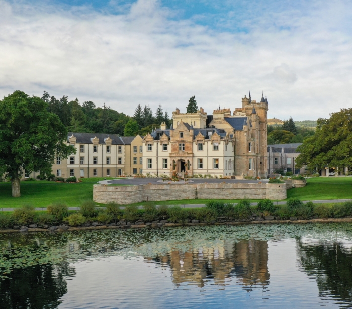 Exterior of the beautiful Camron House with a pond in the foreground