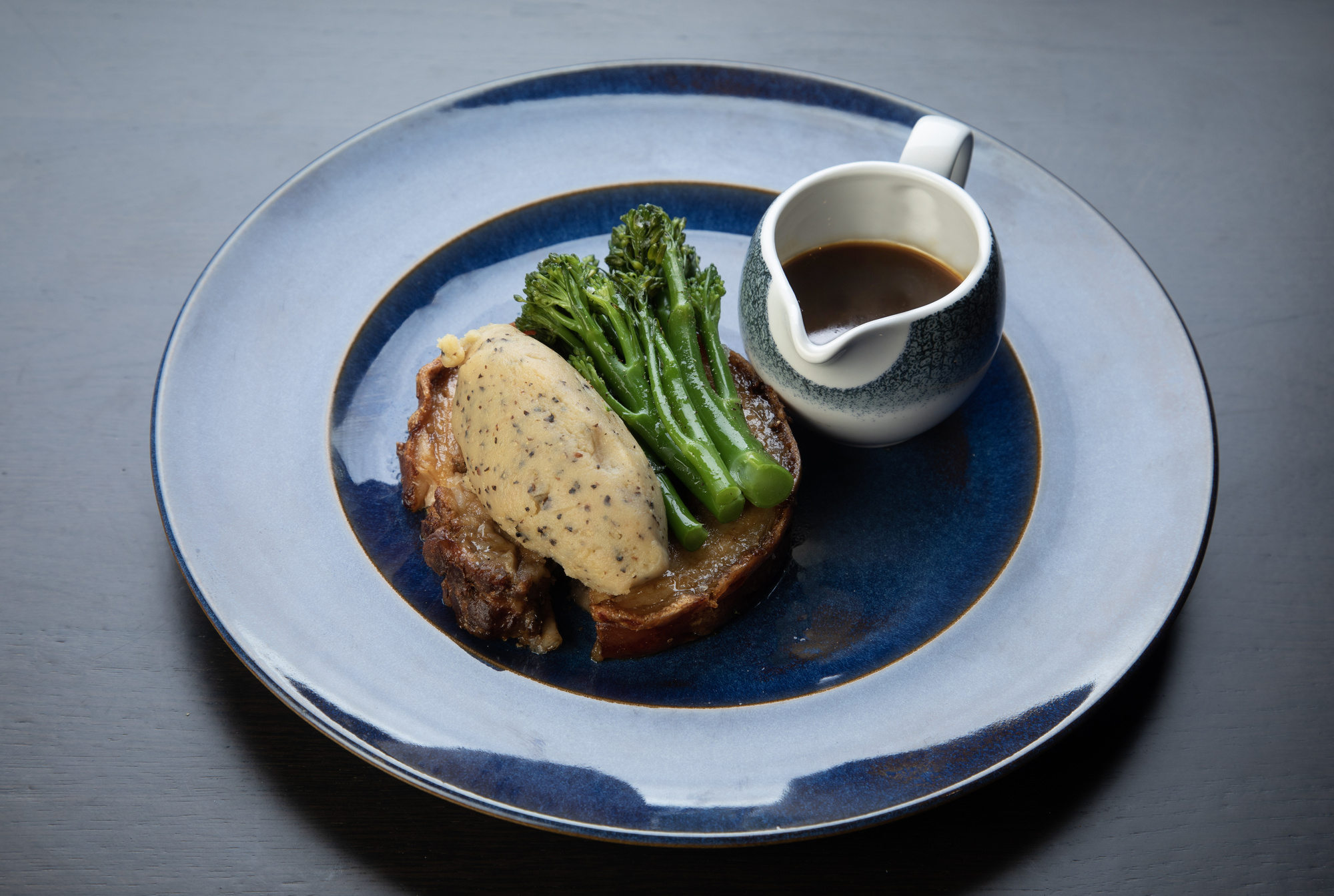 Mouth-watering porchetta and broccoli plate with au jus from La Vista.