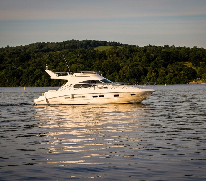 A pleasure boat on the waters of Loch Lomond, near Cameron House Hotel Scotland