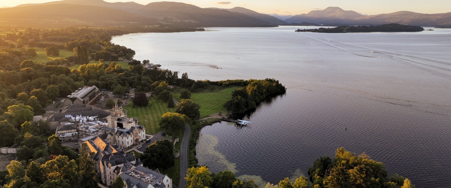 An aerial view of Cameron House with Loch Lomond in the background