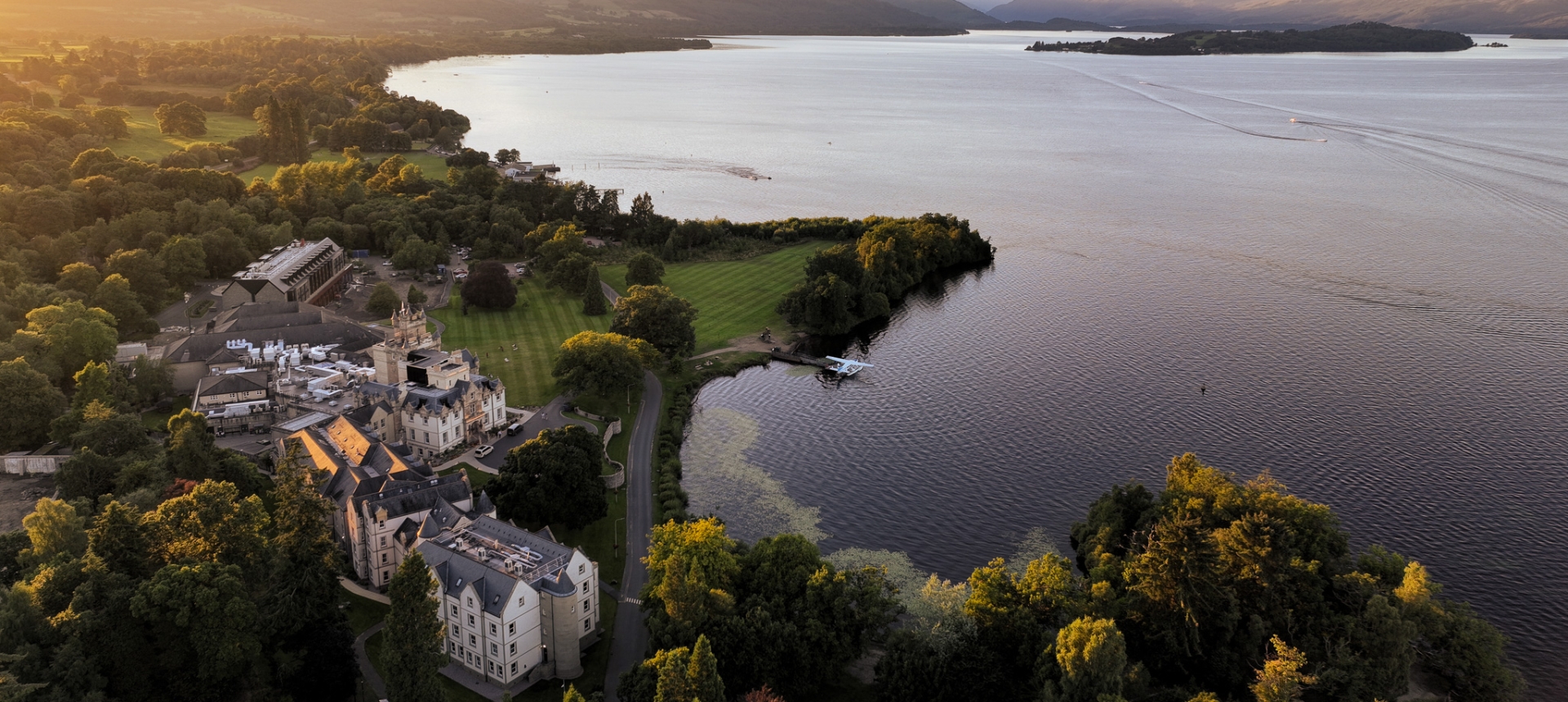 An aerial view of Cameron House with Loch Lomond in the background