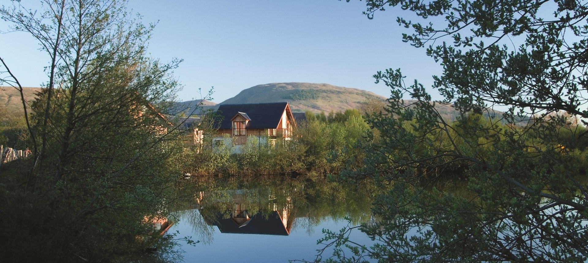 The Carrick Lodges as seen from across the water