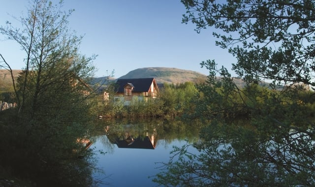 The Carrick Lodges as seen from across the water