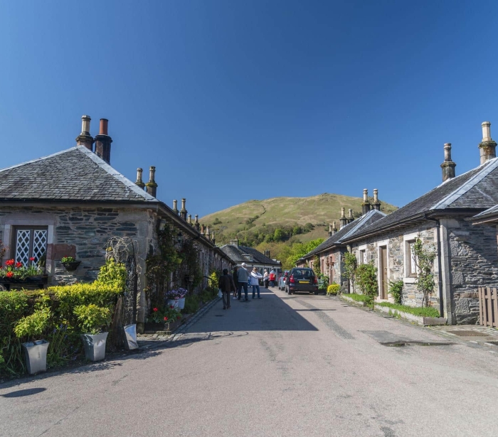 A street in Luss during a sunny day.